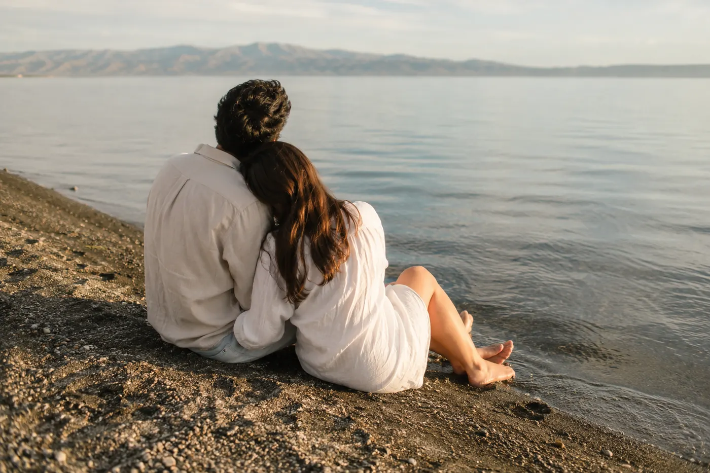 Quiet beach or lakeside moment — aesthetic couple picture idea